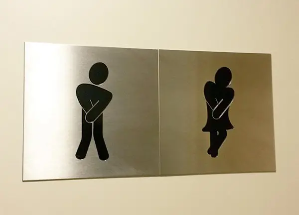 Creative Bathroom Signs holding it in