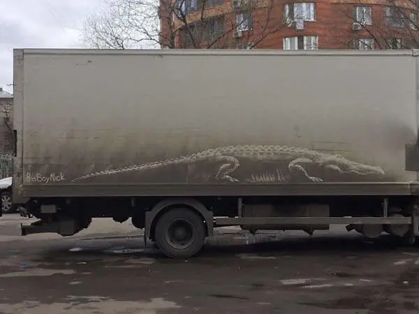 Genius Vandalism alligator on truck