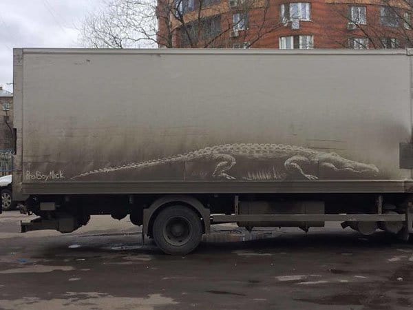 Genius Vandalism alligator on truck