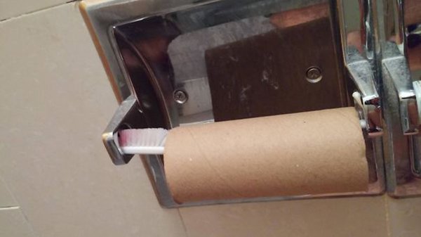 Hotel Fails toothbrush holding toilet roll