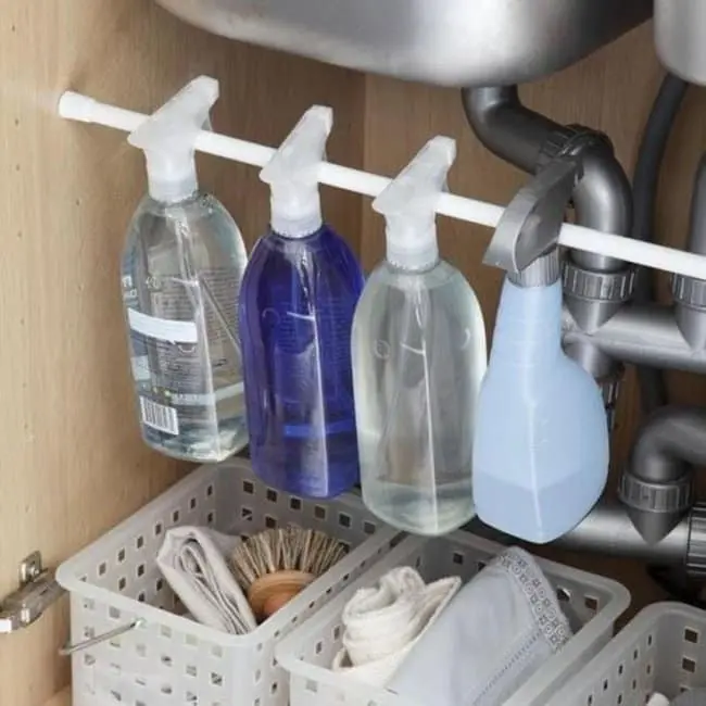 Ways To Organize Your Home tension rod cleaning supplies