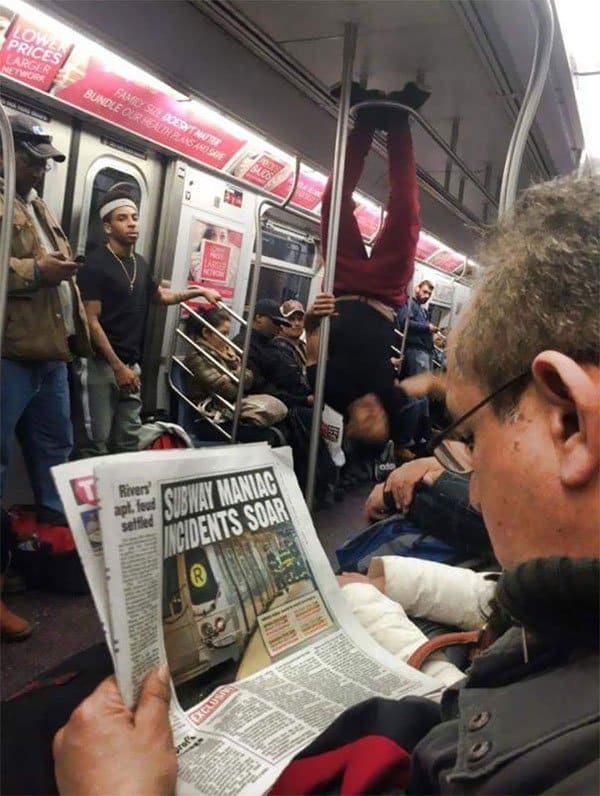 Weirdest People Ever Spotted On The Subway guy hanging upside down