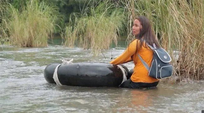 Strength Of The Human Spirit filipino teacher crosses river