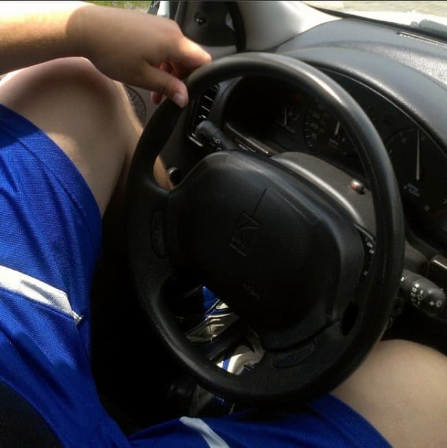 Amusing Photos Tall People steering wheel