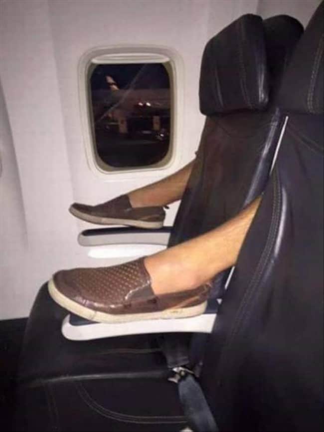 Crazy Things Spotted On Flights shoes on armrests