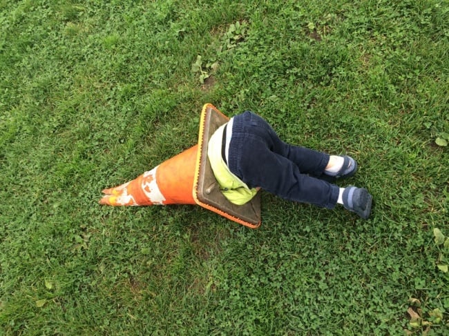 Kids Being Strange stuck in cone