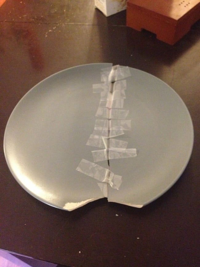 family humor taped broken plate