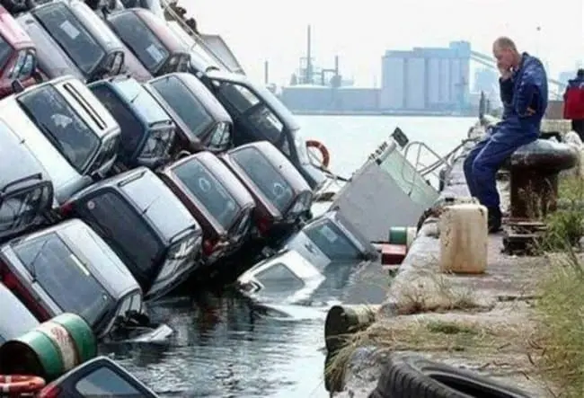 Awful Day At Work cars falling in water