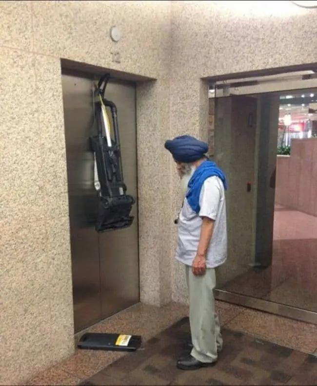 Awful Day At Work vaccum stuck in lift