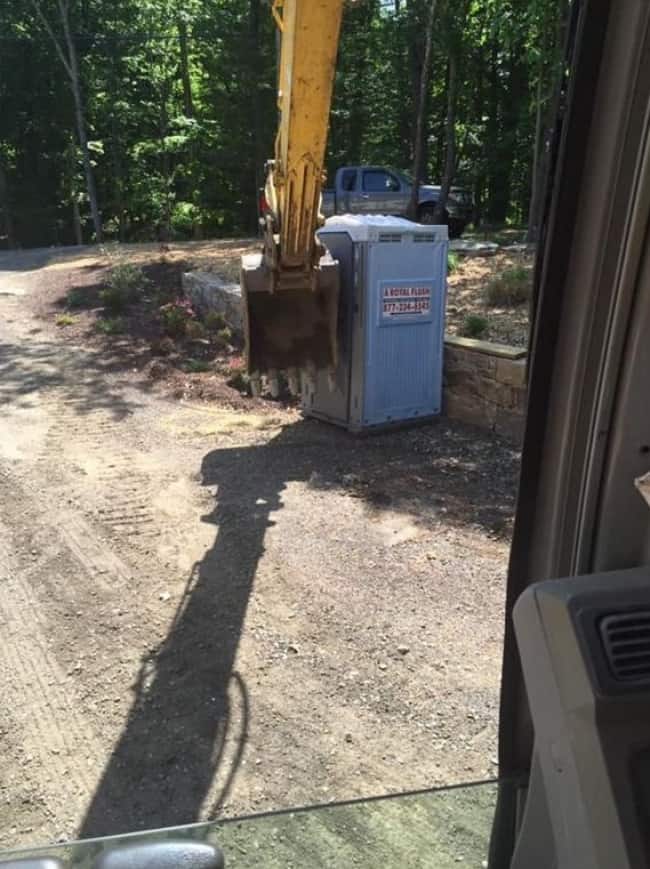 rude_guy_locked_in_a_porta_potty