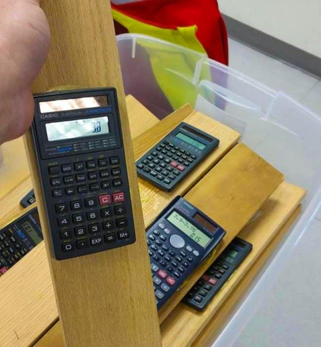 calculators-glued-on-wooden-planks-inventive-people