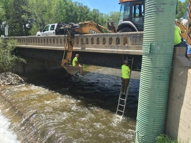 daring-men-under-bridge