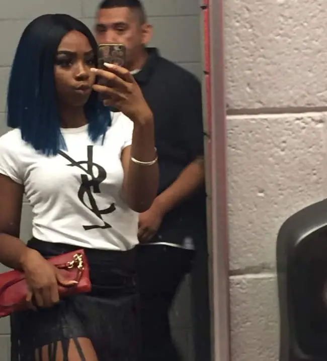 girl_taking_selfie_inside_men_bathroom