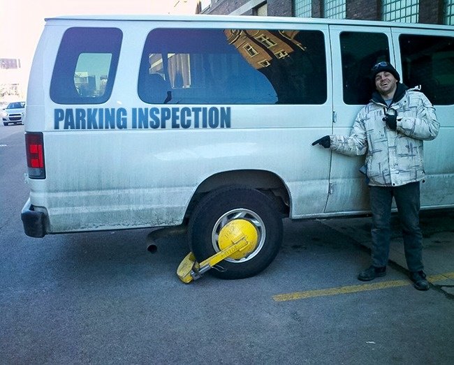 parking_inspector_car_got_parking_violation_self_irony