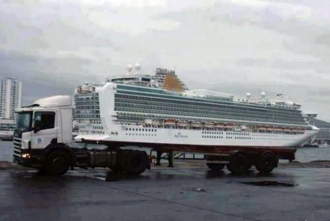 truck-seems-like-carrying-a-cruise-ship-confusing-pictures