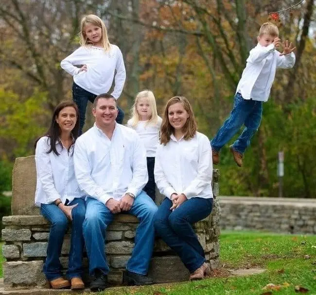 boy-jumping-away-hilarious-family-photos