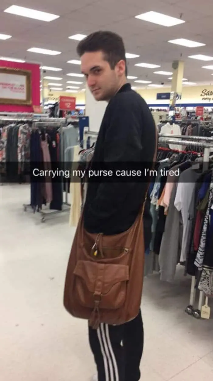 boyfriend-carries-purse-men-hate-shopping
