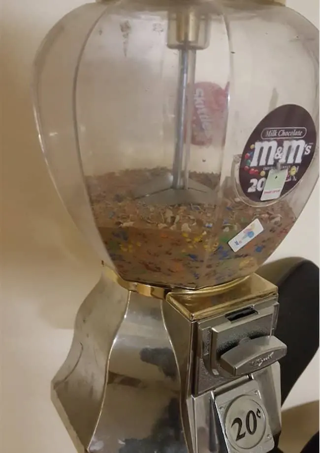 chocolate-candies-in-a-candy-dispenser-for-10-years-time-shows-no-mercy