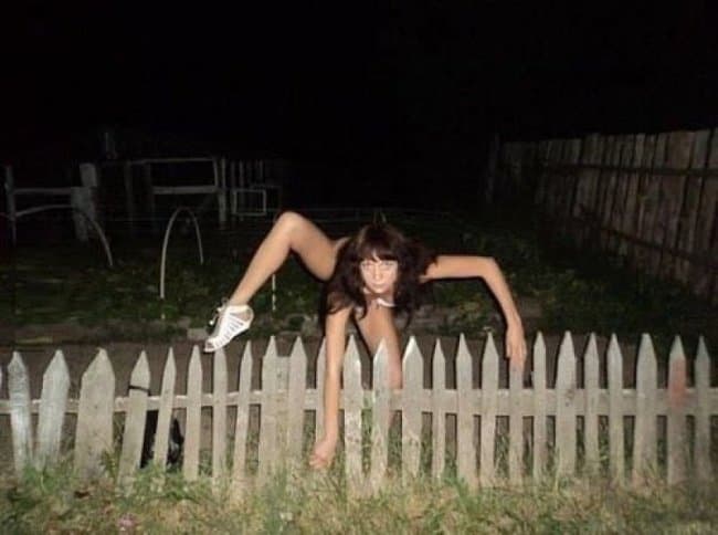 creepy-girl-crawling-over-the-fence-photos-that-make-zero-sense
