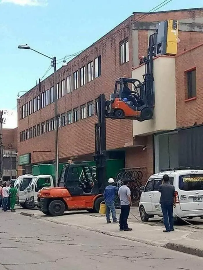 forklift-lifting-another-audacious-workers