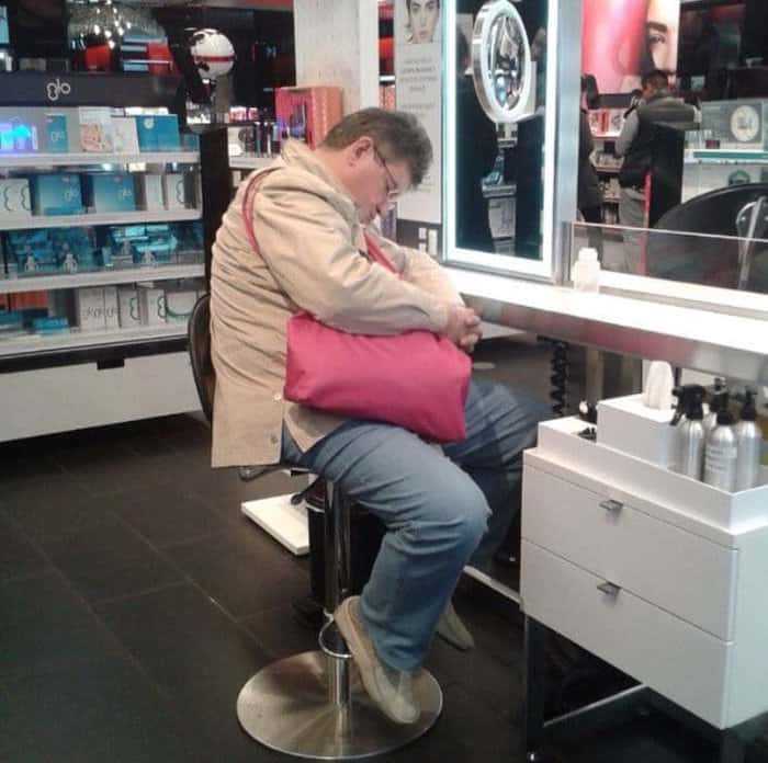 man-doozing-off-at-sephora-men-hate-shopping