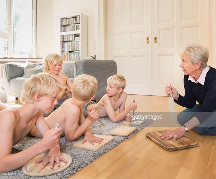 old-lady-teaching-blond-kids-finger-stabbing-weird-stock-photos