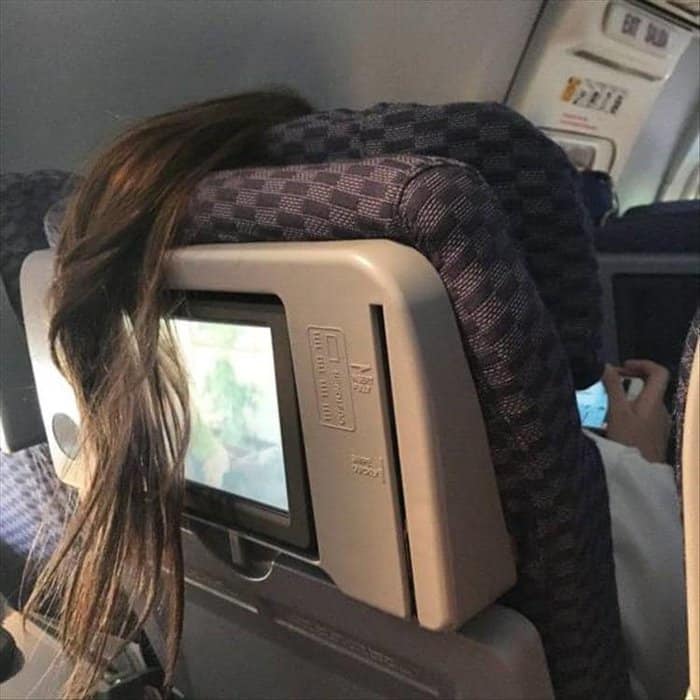 passenger-hair-covering-monitor-annoying-photos