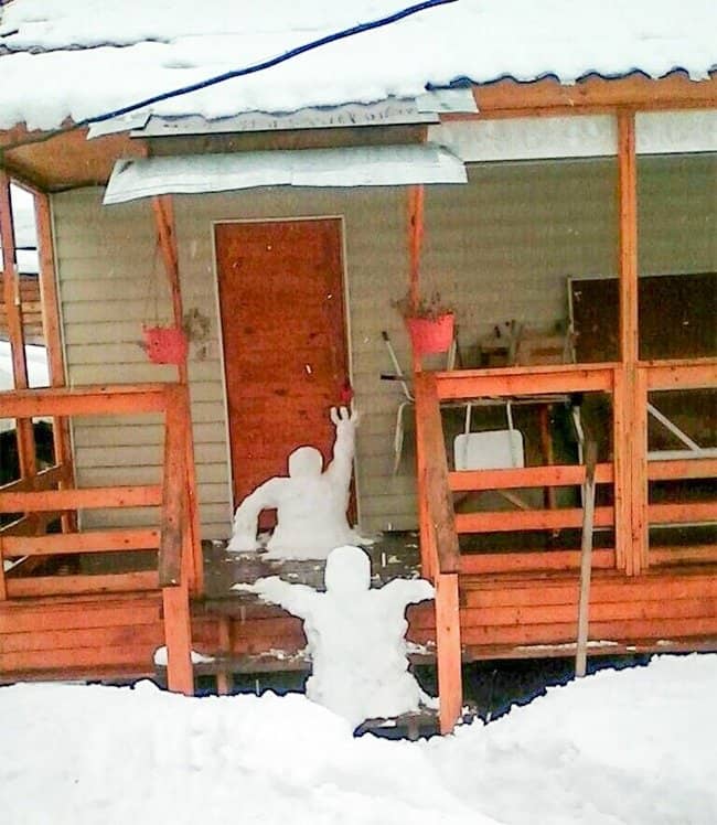 uncle-made-funny-snow-man-on-the-front-porch-humor-makes-happy-family