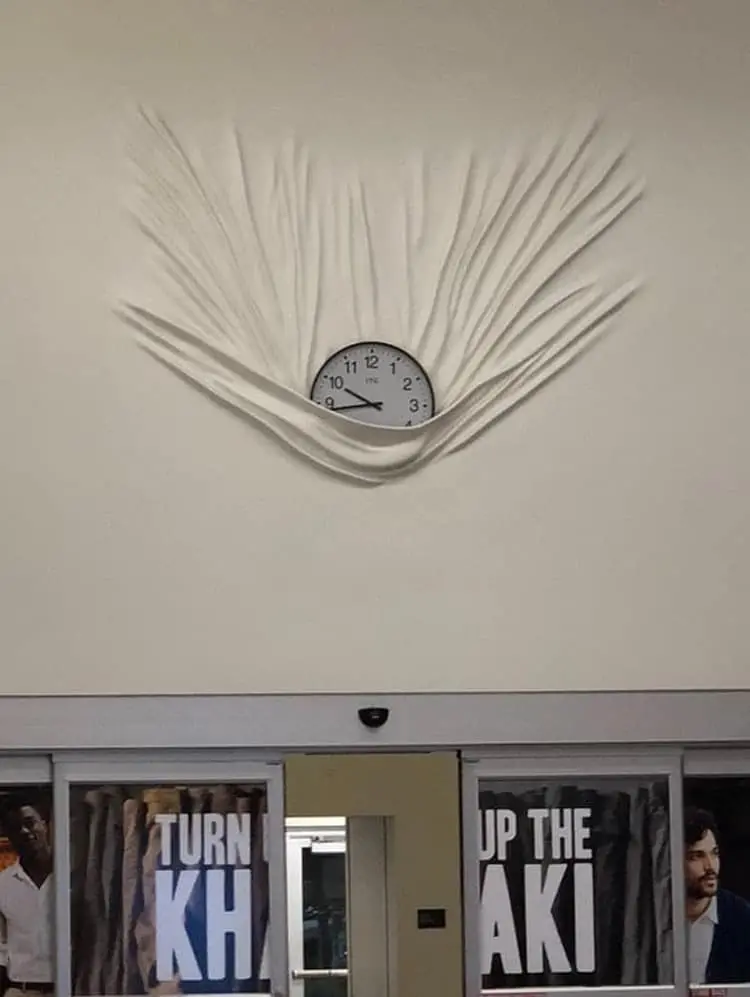 clock on a melting wall strange things