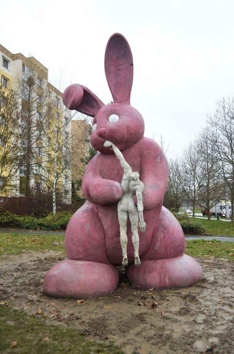 giant-bunny-devouring-a-man-creepy-pictures
