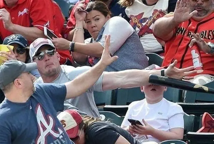 kid-saved-from-a-flying-baseball-bat-craziest-close-calls