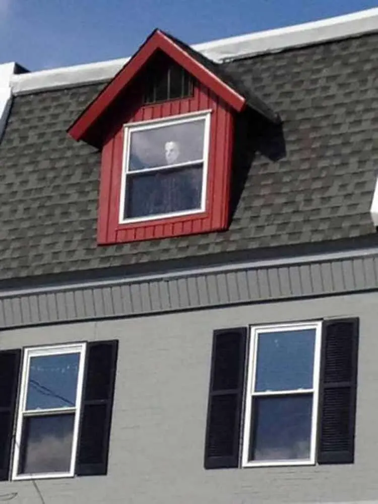 man-with-a-mask-on-the-window-creepy-pictures