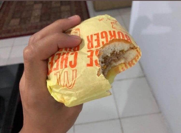 biting-burger-wrapper-outrageous-photos