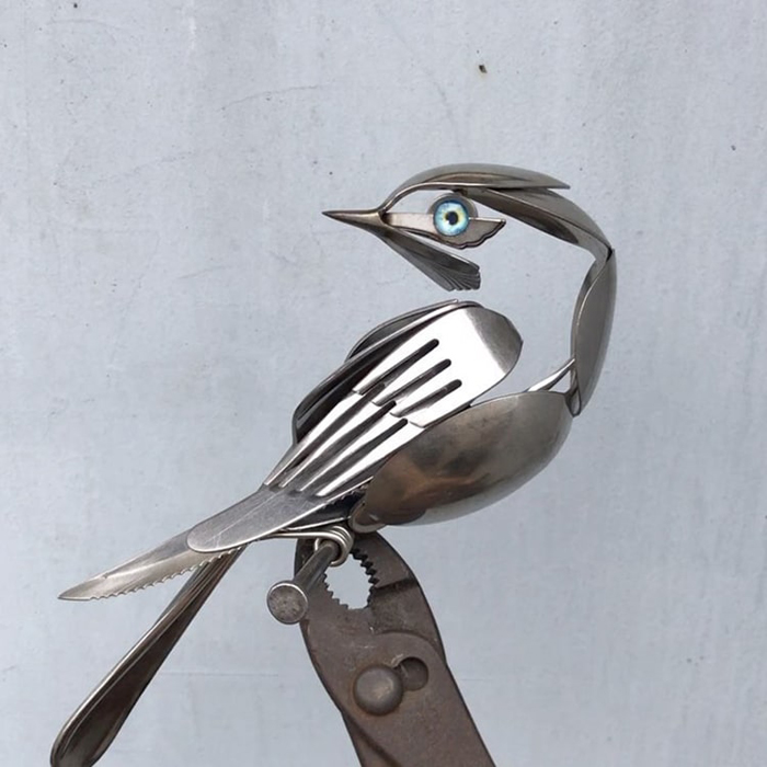 bird sculpture from forks and spoons