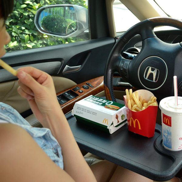 Smart Steering Wheel Tray Lets You Eat in the Comfort of Your Car