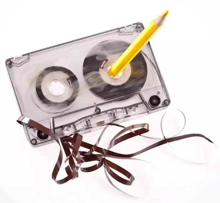 90's kids struggles cassette tape tangled