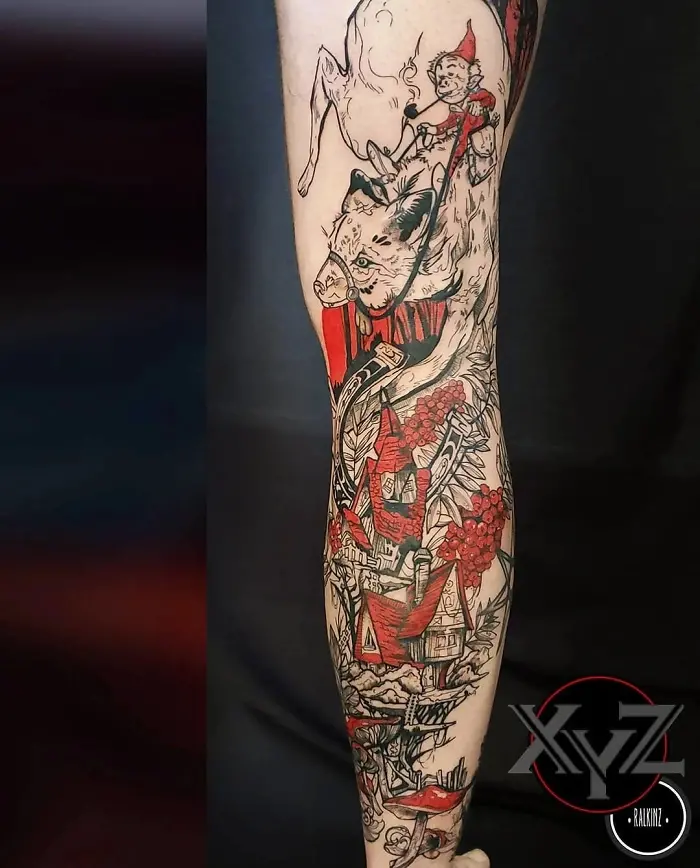 folklore-inspired leg tattoo