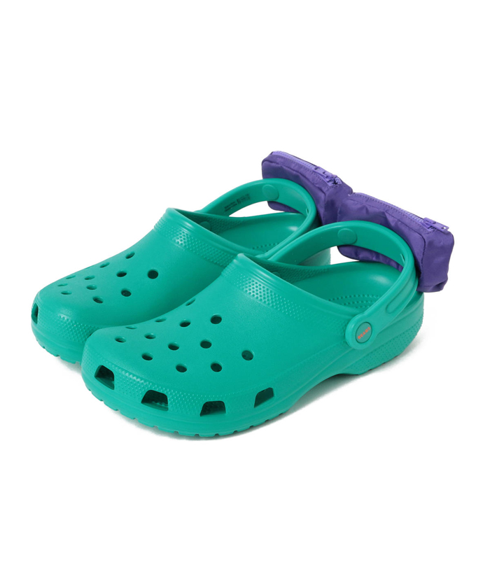 green crocs with fanny packs