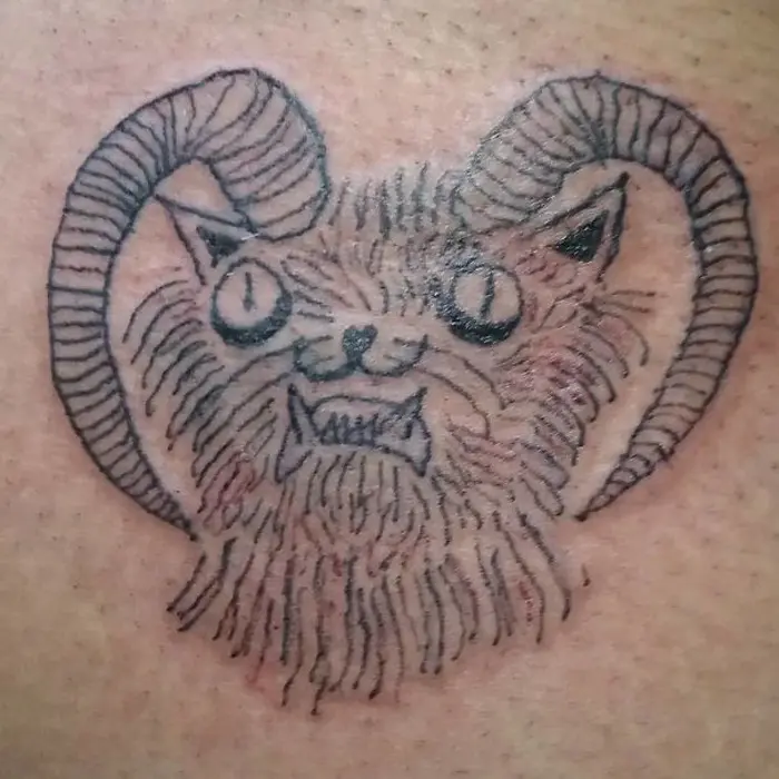 helena fernandes hideous tattoos demon cat