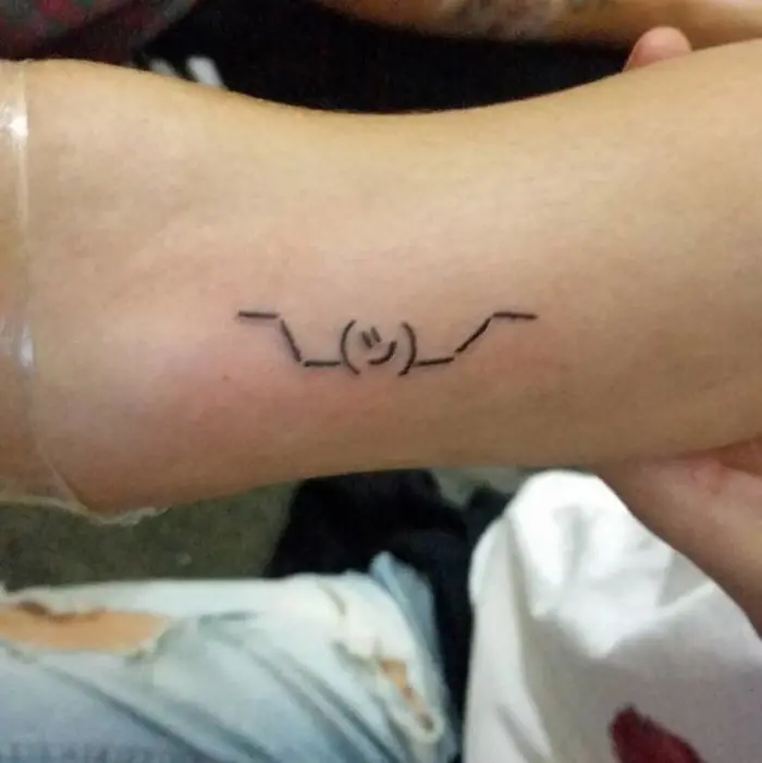 helena fernandes hideous tattoos emoticon