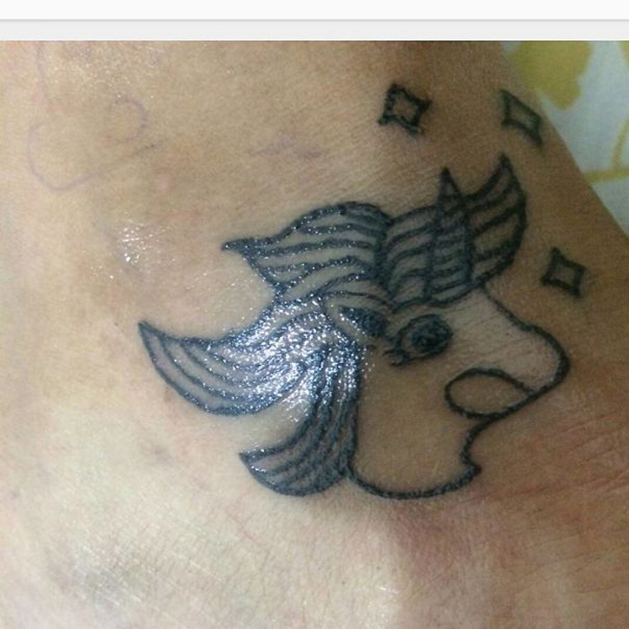 helena fernandes hideous tattoos unicorn