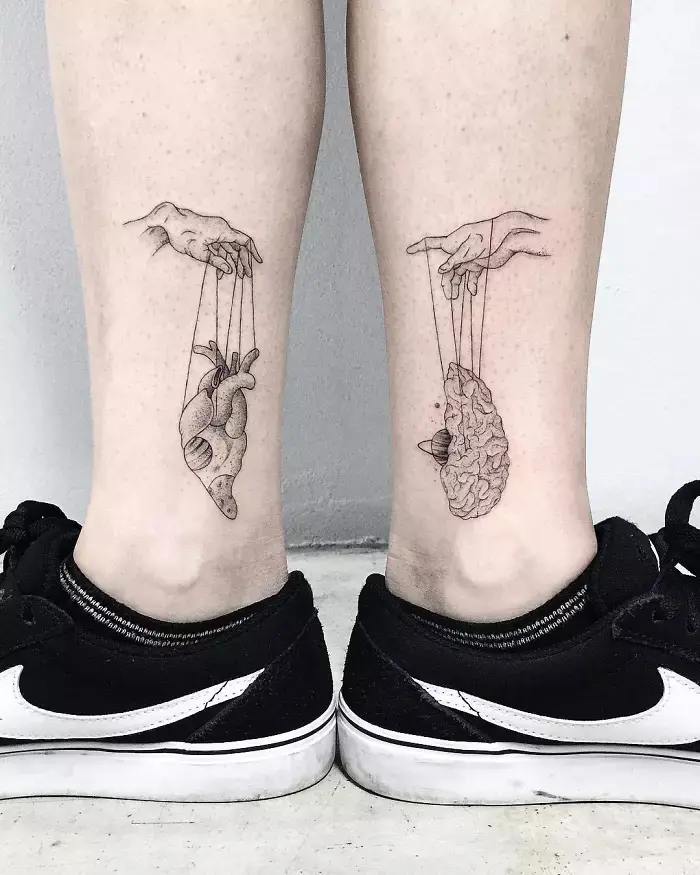 minimalist leg tattoo