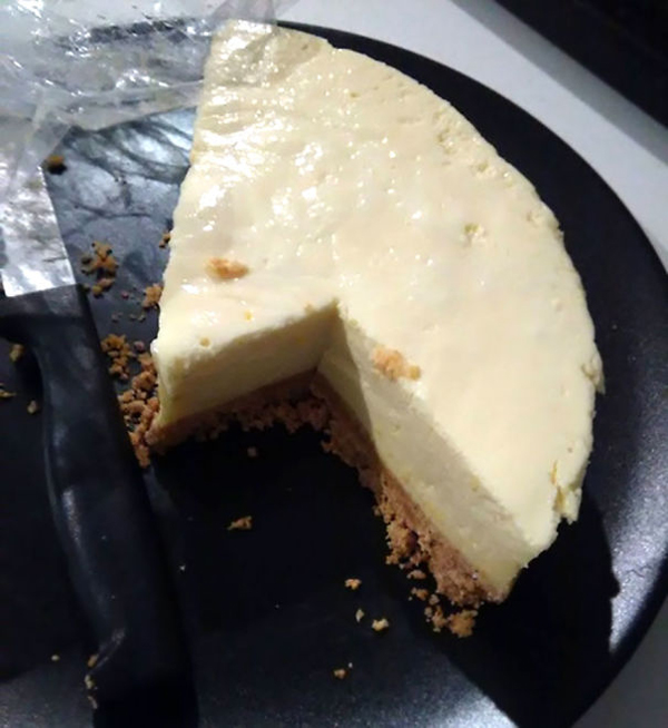 monster roommate slicing cheesecake