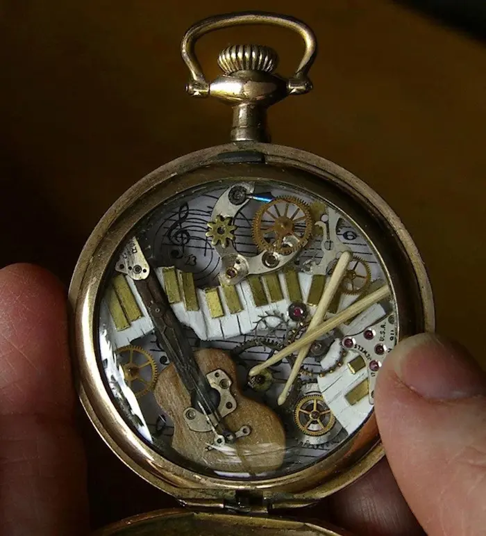 recycled watch musical instruments sculpture