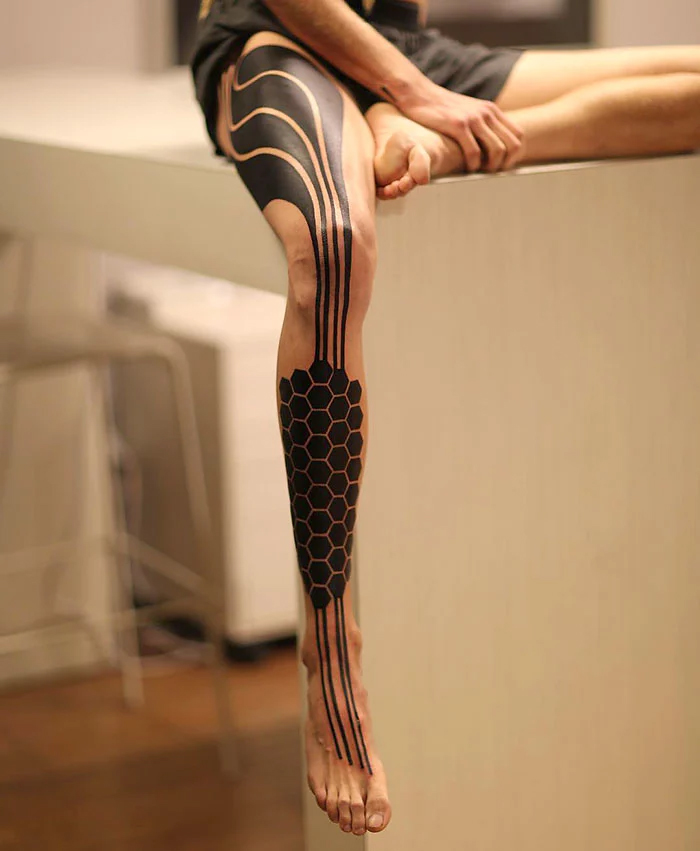 robotic leg tattoo