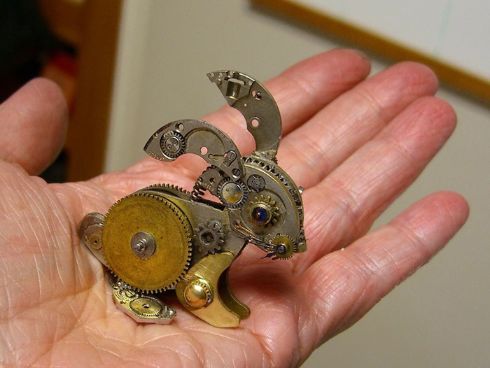 spectacular tiny sculptures made of recycled watches