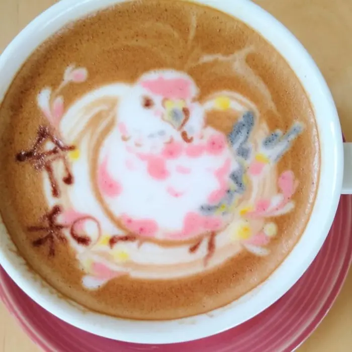 ku-san bird latte art pinkish gray