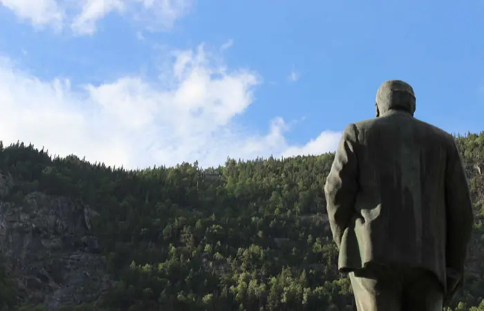 man looking sun mirror in Rjukan Norway