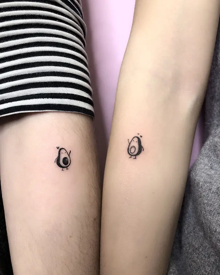 matching tattoos avocado halves
