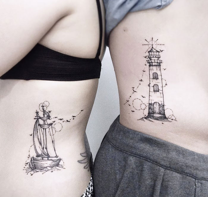 matching tattoos couple lighthouse ship